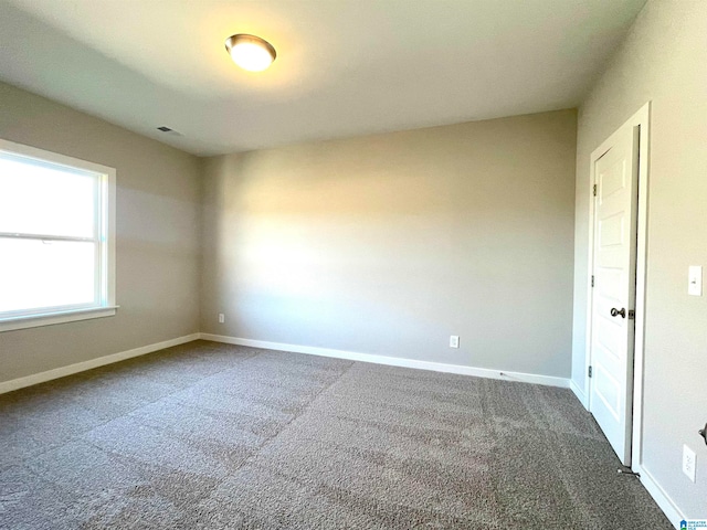 view of carpeted spare room