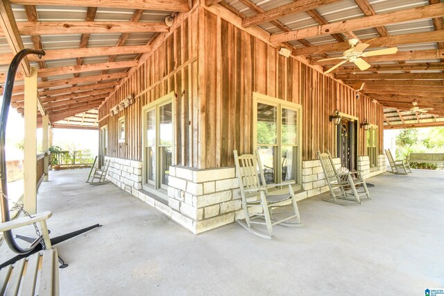 view of horse barn featuring ceiling fan