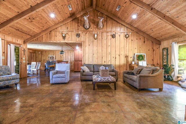 living room with beamed ceiling, wooden ceiling, and wood walls