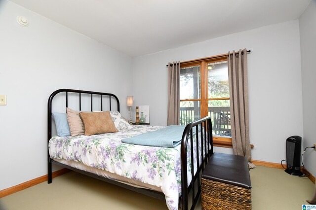 bedroom featuring carpet flooring