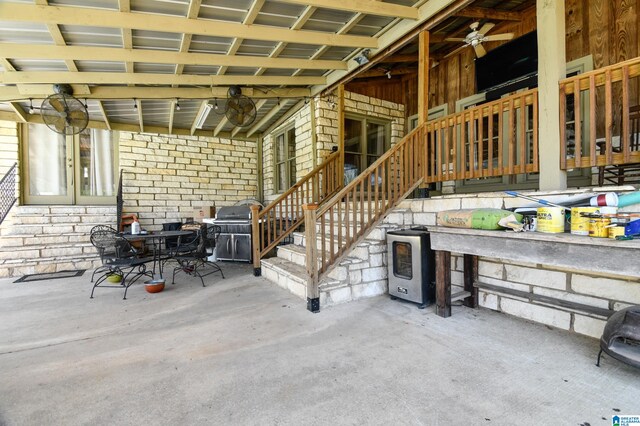 view of patio / terrace with area for grilling and ceiling fan