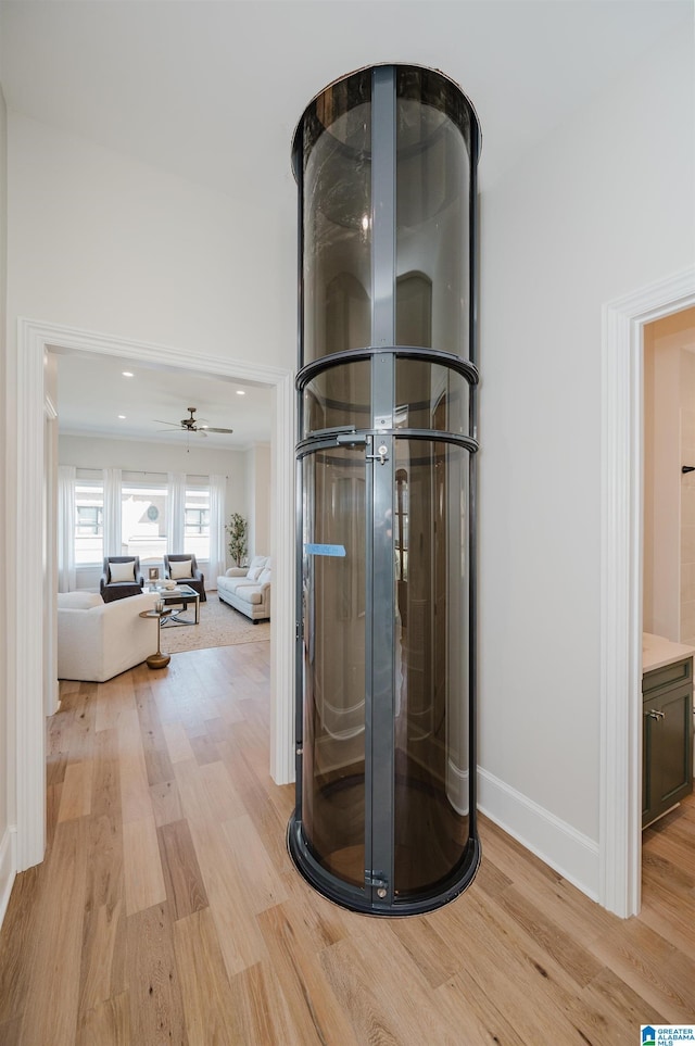 details featuring recessed lighting, baseboards, and wood finished floors