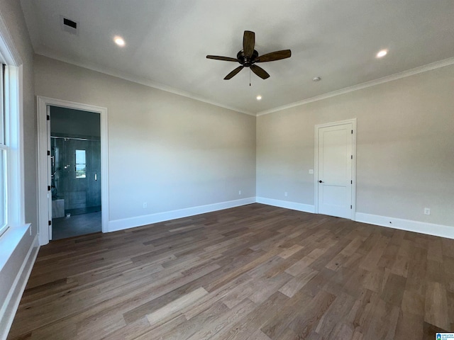 unfurnished room with ornamental molding, wood-type flooring, and ceiling fan