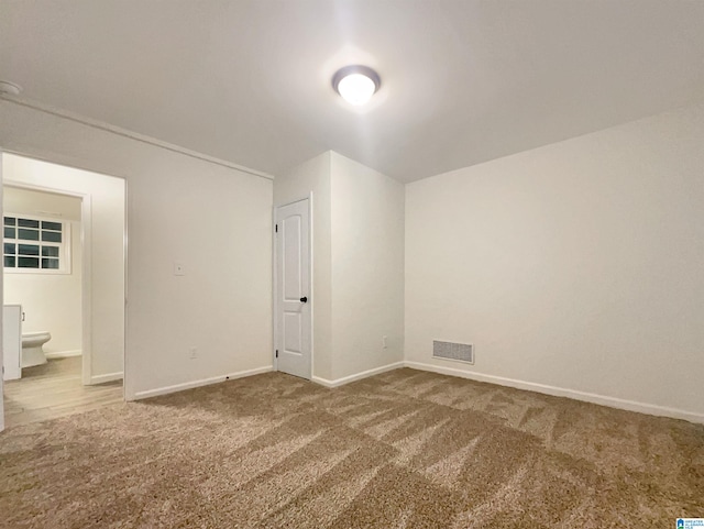 view of carpeted spare room