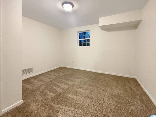 view of carpeted spare room