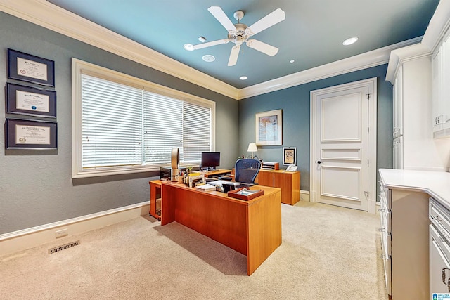 carpeted office with ceiling fan and crown molding