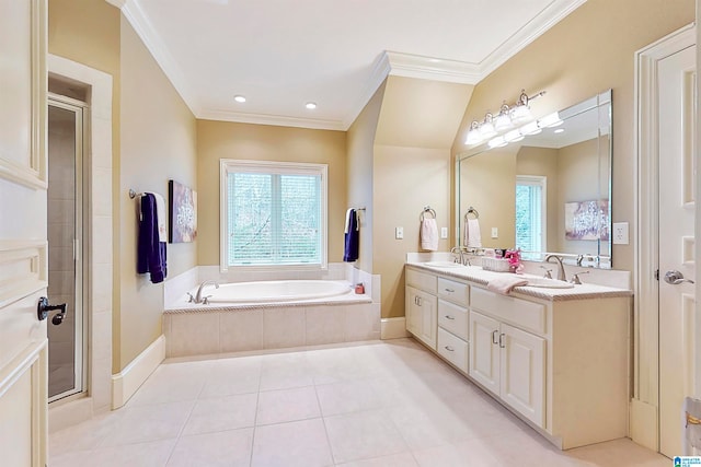 bathroom with double sink vanity, crown molding, tile floors, and plus walk in shower