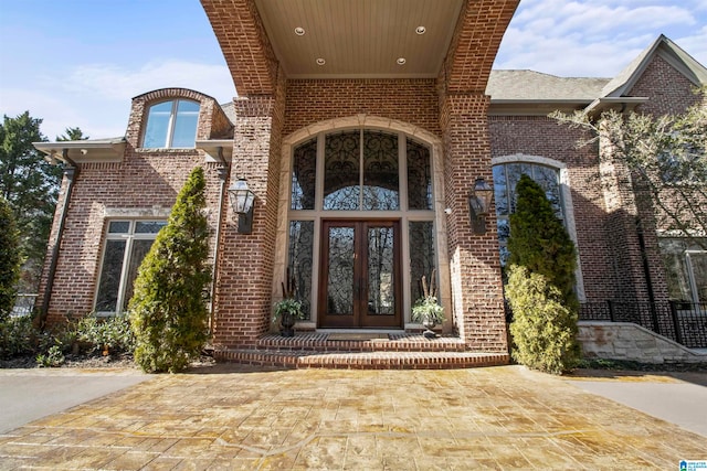 property entrance featuring french doors