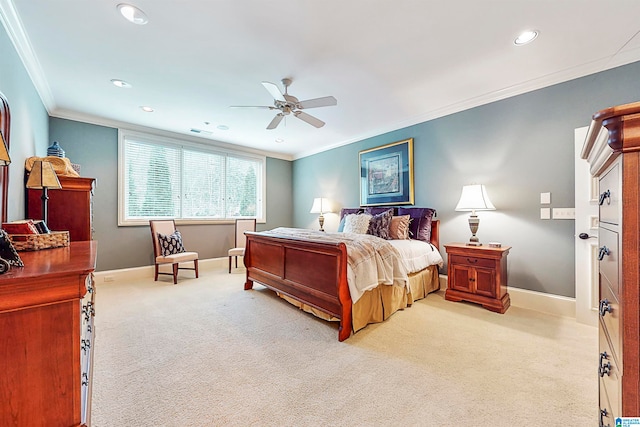 carpeted bedroom with crown molding and ceiling fan