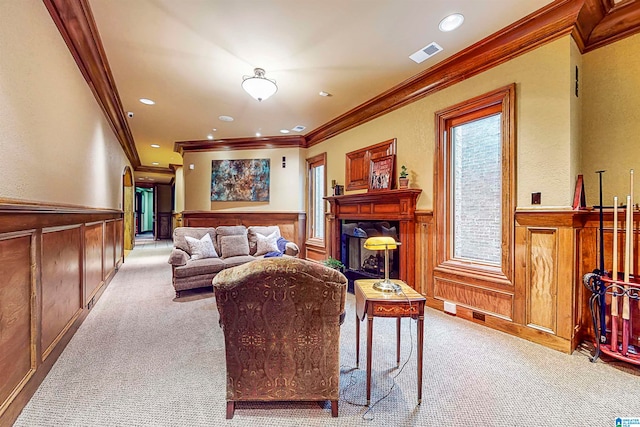 living room with carpet flooring and crown molding