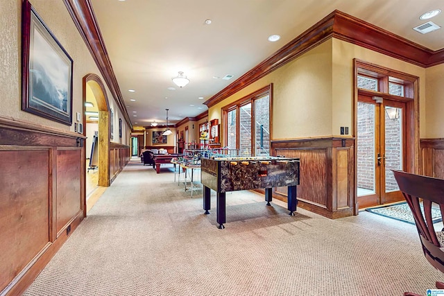 game room with ornamental molding, pool table, light carpet, and french doors