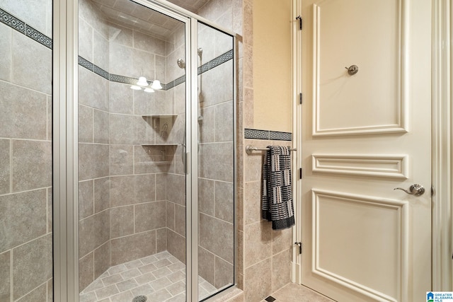 bathroom featuring an enclosed shower