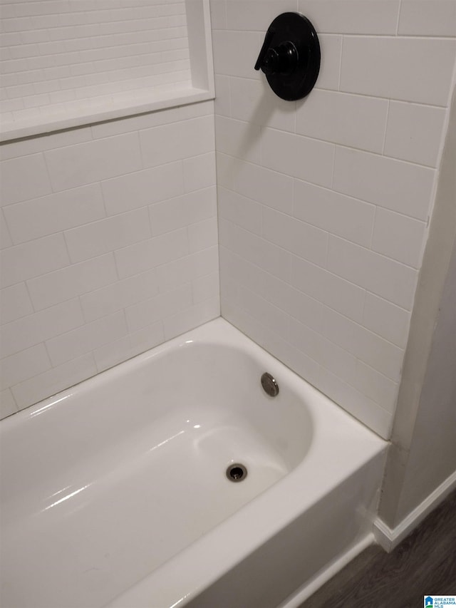 bathroom featuring wood-type flooring