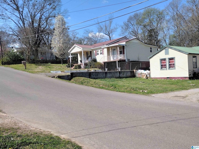 exterior space with a front yard