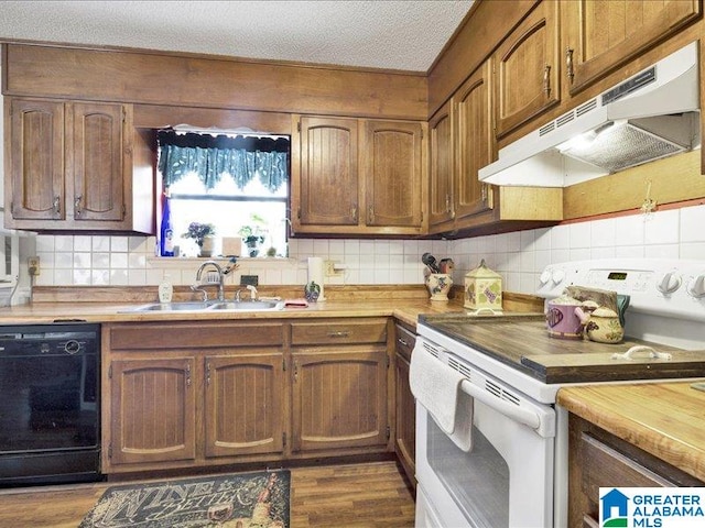 kitchen with dark hardwood / wood-style floors, sink, black dishwasher, white range with electric stovetop, and tasteful backsplash