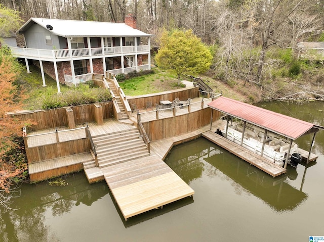 dock area with a water view