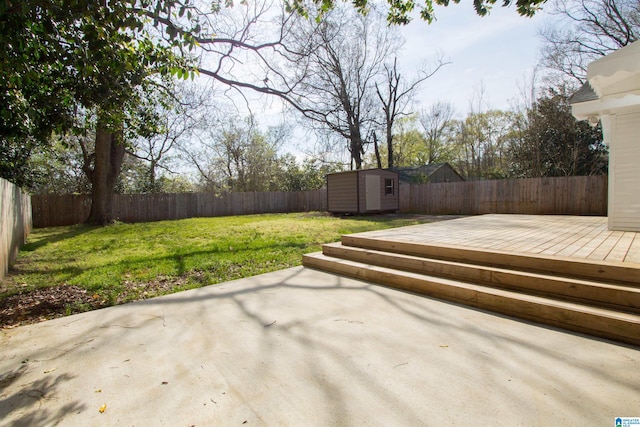 view of terrace featuring a deck and a shed