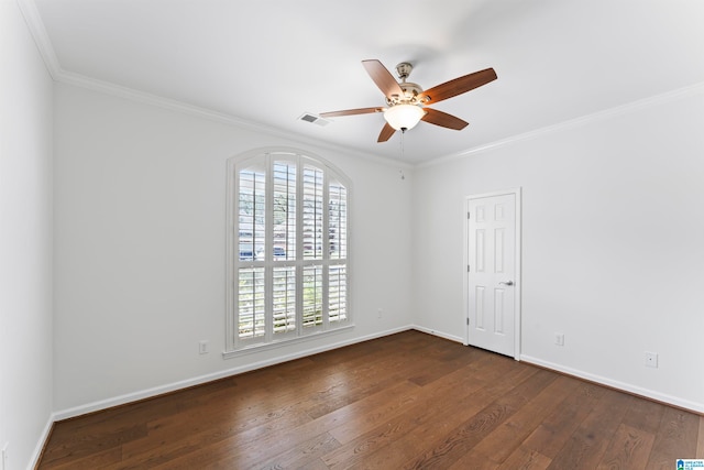 unfurnished room with ornamental molding, dark hardwood / wood-style flooring, and ceiling fan