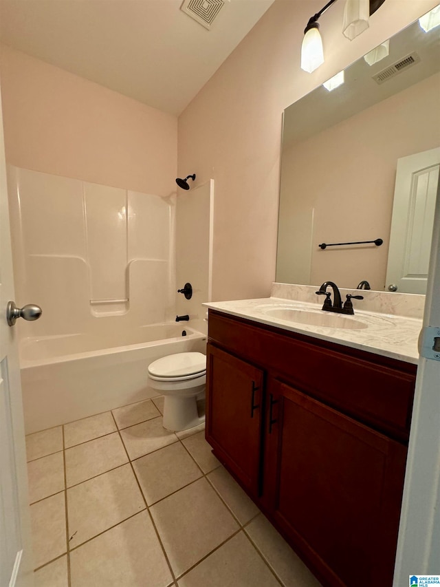 full bathroom with tile flooring, vanity, toilet, and shower / washtub combination