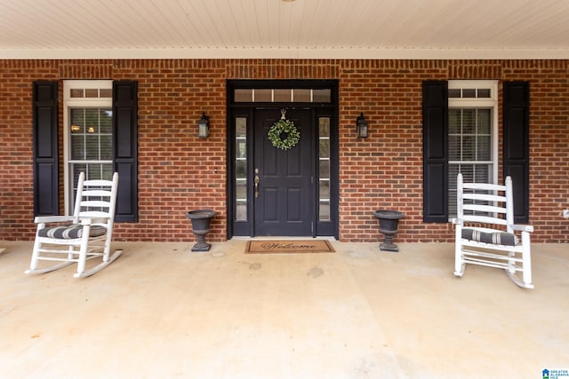 entrance to property with a porch