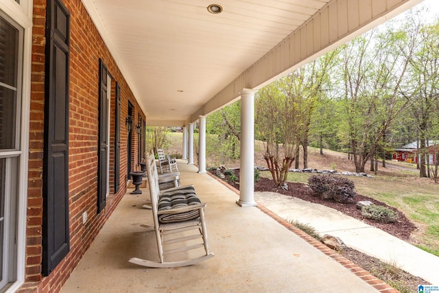 view of patio featuring a porch