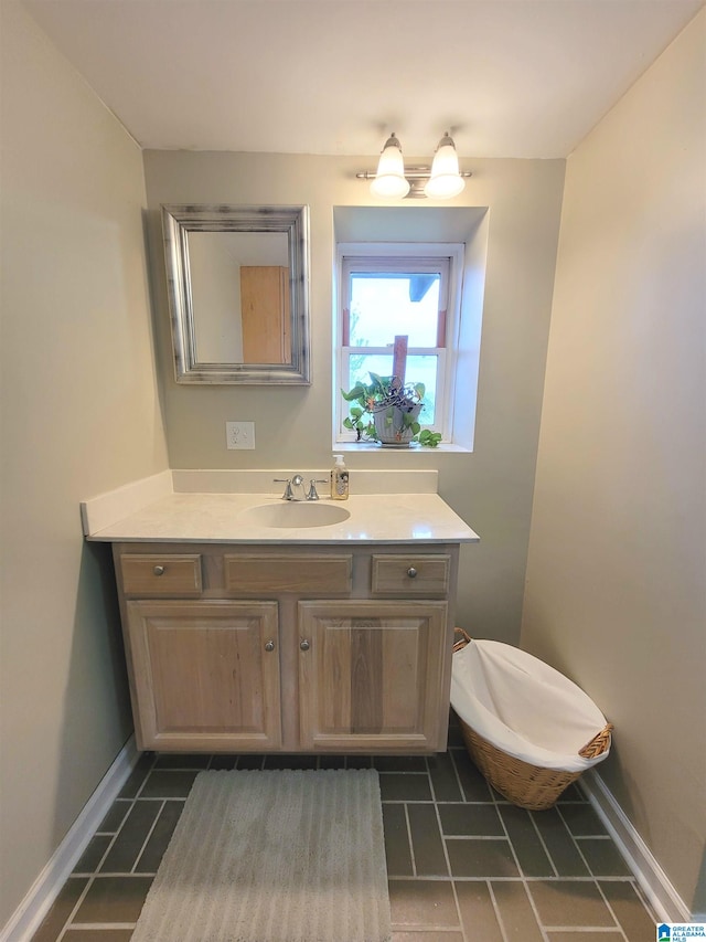 bathroom featuring vanity and tile patterned flooring