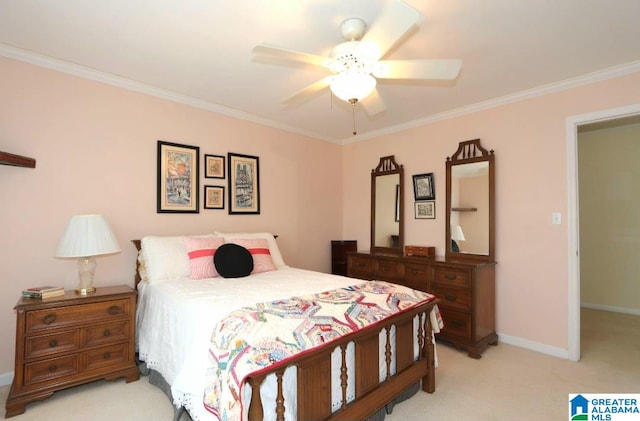 carpeted bedroom featuring ornamental molding and ceiling fan