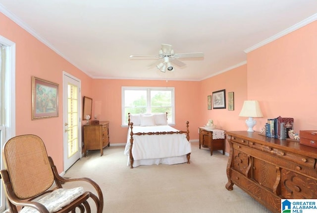 carpeted bedroom featuring ornamental molding and ceiling fan