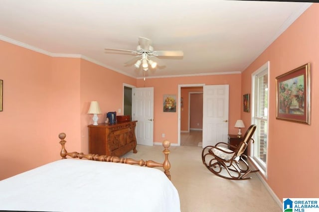 bedroom with crown molding, carpet floors, and ceiling fan