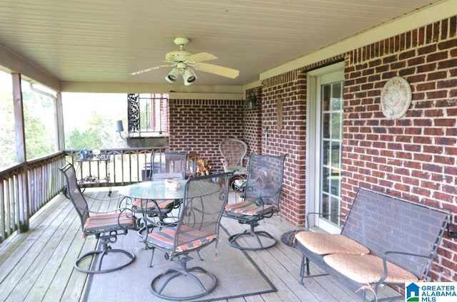 exterior space with ceiling fan