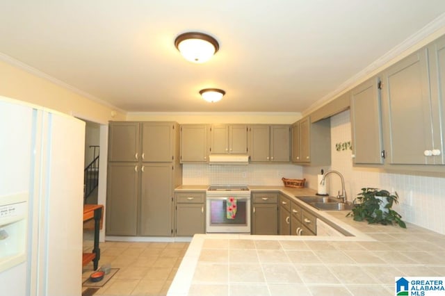 kitchen with tasteful backsplash, white electric range, ornamental molding, sink, and light tile patterned floors