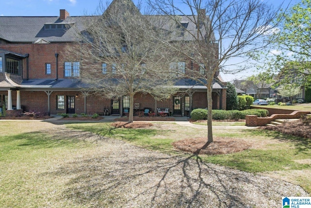 exterior space with a front lawn