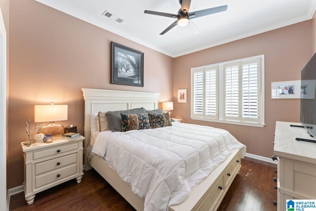 bedroom with ceiling fan, crown molding, and dark wood-type flooring