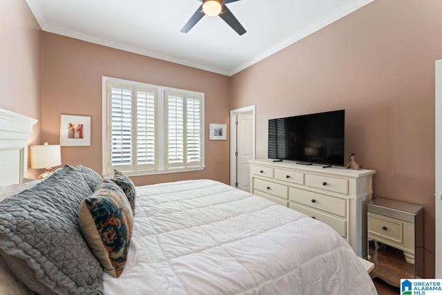 bedroom featuring crown molding, dark hardwood / wood-style floors, and ceiling fan