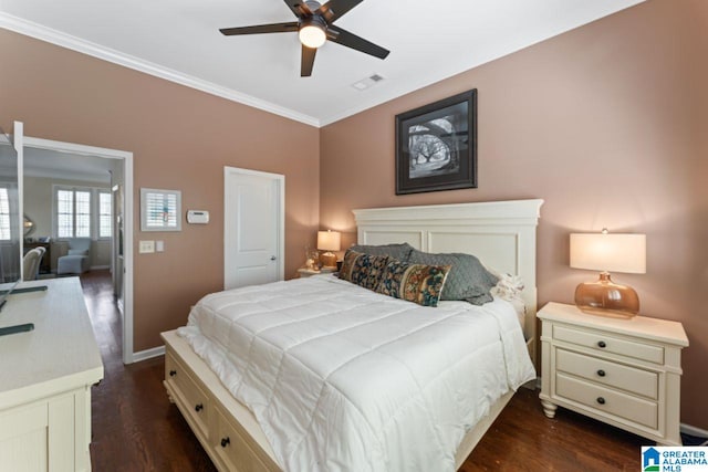 bedroom featuring ceiling fan, crown molding, and dark wood-type flooring