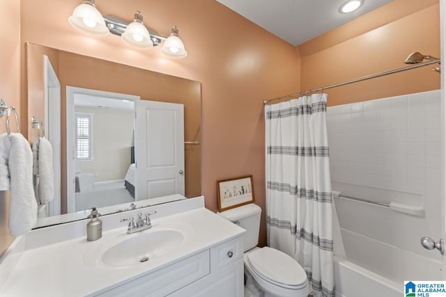 full bathroom with shower / bath combination with curtain, large vanity, and toilet