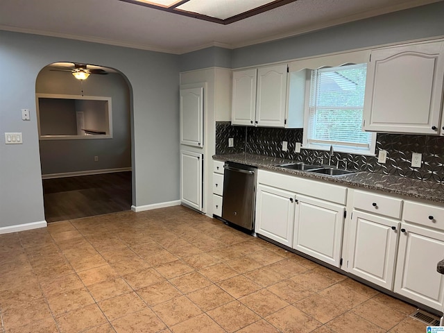 kitchen with sink, ceiling fan, stainless steel dishwasher, white cabinetry, and light wood-type flooring