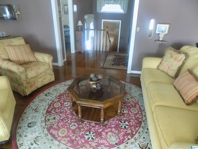 living room with dark wood-type flooring