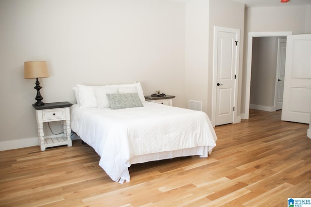 bedroom featuring light wood-type flooring