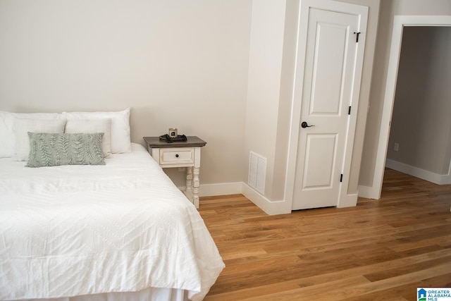 bedroom featuring light hardwood / wood-style floors