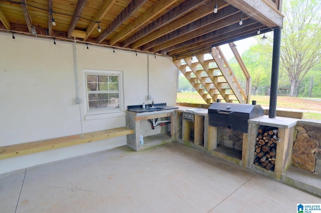 view of patio / terrace featuring exterior kitchen