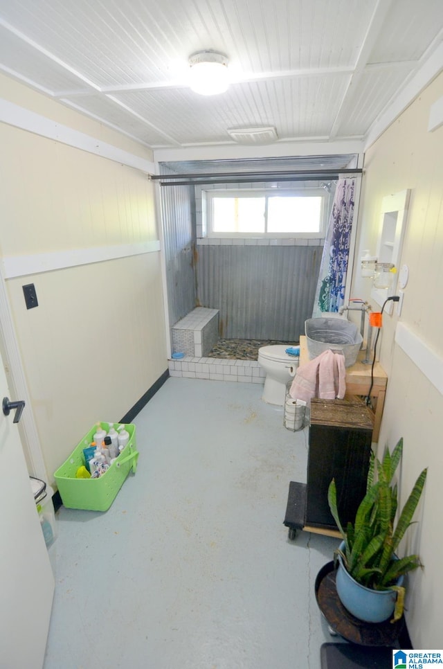 interior space featuring concrete floors and sink