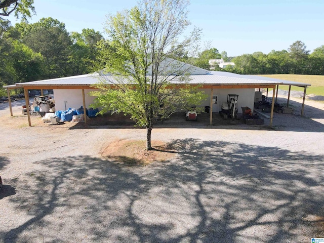 view of front facade with a carport