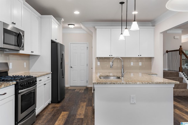 kitchen featuring sink, crown molding, backsplash, stainless steel appliances, and dark wood-type flooring