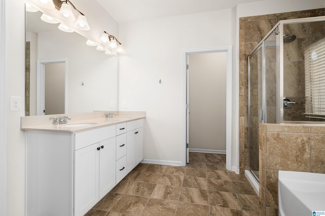 bathroom with dual vanity, separate shower and tub, and tile floors