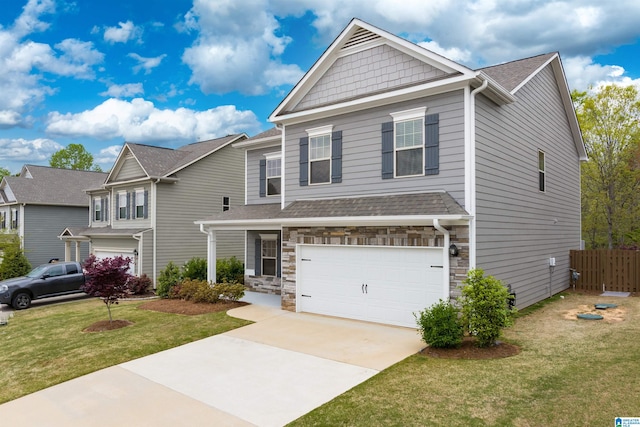 view of front of home with a front lawn and a garage