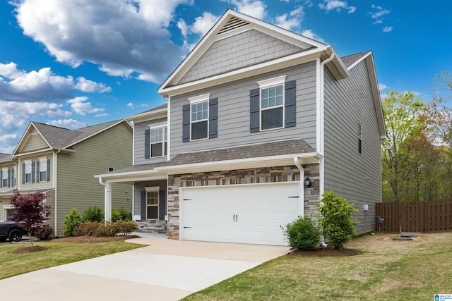 craftsman inspired home with a front lawn and a garage