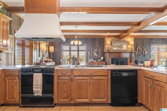 kitchen with light tile floors, black appliances, custom exhaust hood, pendant lighting, and beam ceiling
