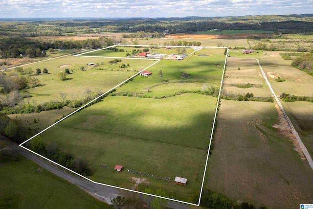 birds eye view of property featuring a rural view