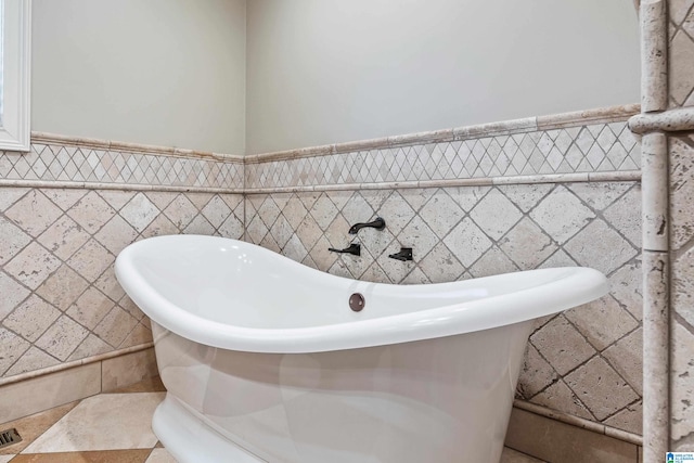 bathroom with tile walls
